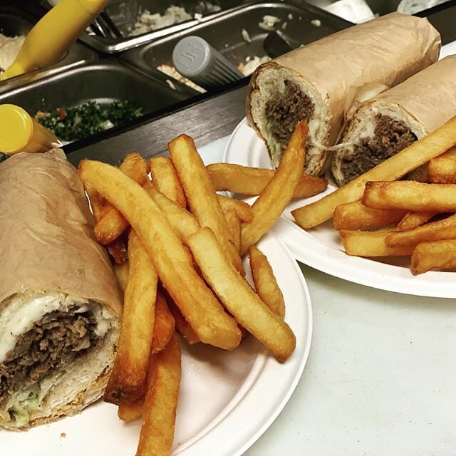 Steak and cheese with crispy fries coming right up!  #yalla #eatatghassans #ghassans #gsotakeout #takeoutgso #ghassansfreshmediterraneaneats #eatlocal
