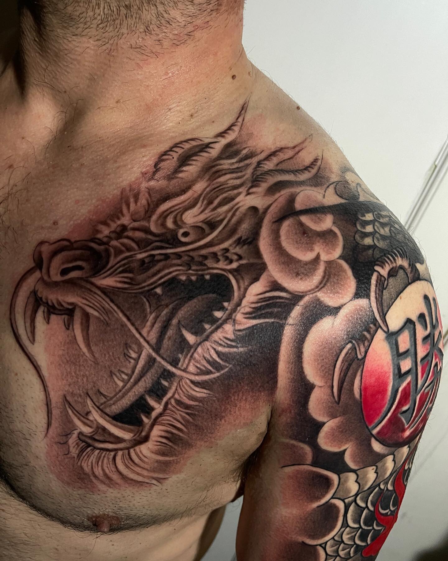 A lil dragon transformation from traditional to realism, hence the backward approach to this design hope you guys enjoy this tattoo