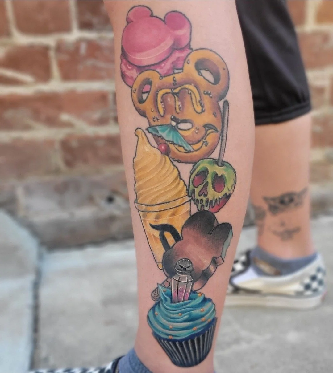 Full color tattoo of Disneyland-themed foods and treats.    