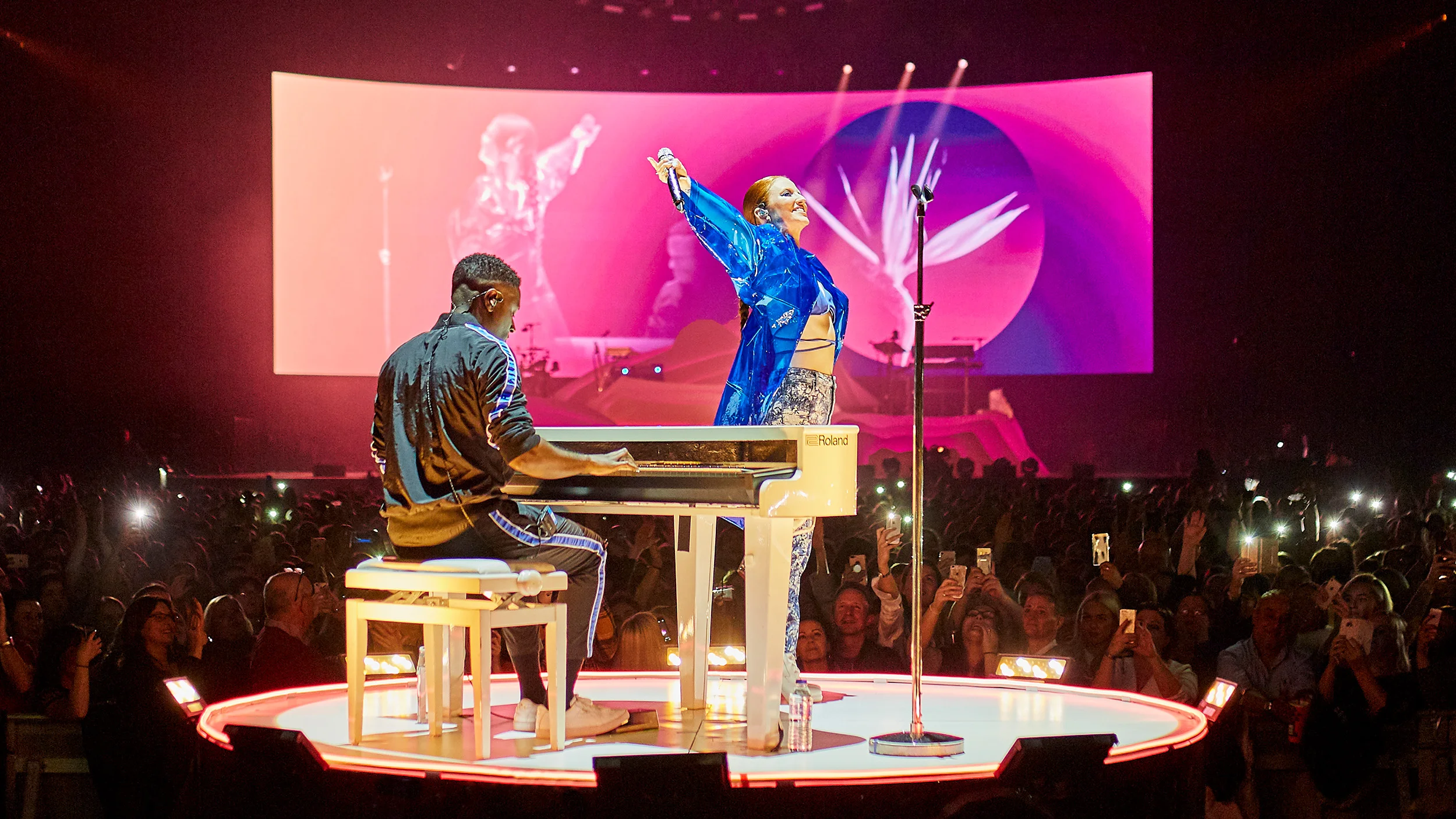 Scenic design that makes smart use of video projections gives the show a seamless cinematic flow