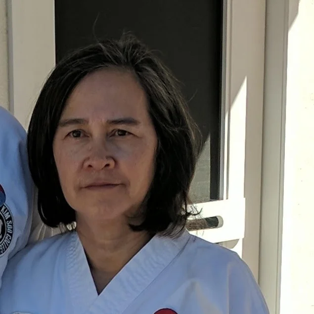  Master Charlotte Hwang 7th Dan Black Belt Promoted April, 2004 Kim Soo Karate of Tucson 