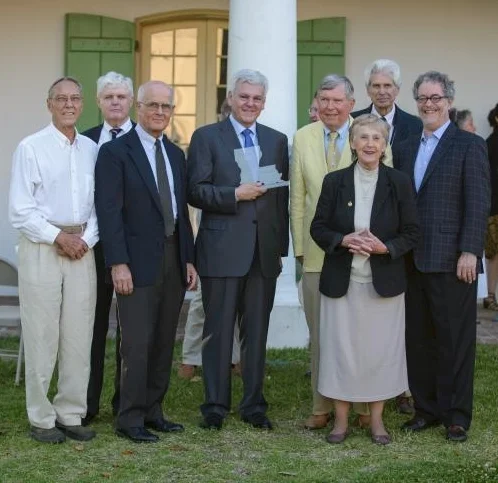 Pictured Above left to right: Previous Harnett Kane Winners - David Campbell, Bill Borah, Michael Duplantier, Nathan Chapman, Bill and Sally Reeves, John Geiser, and James Logan