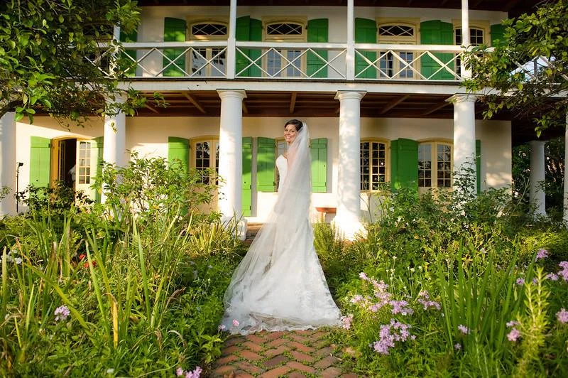 Bride in front of house.jpg