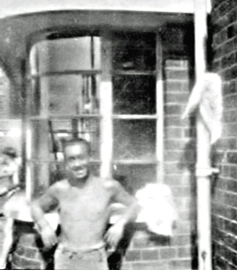 Tom with his towel tied to the drainpipe