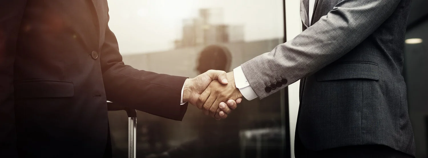 hand shake banner 1500.jpg