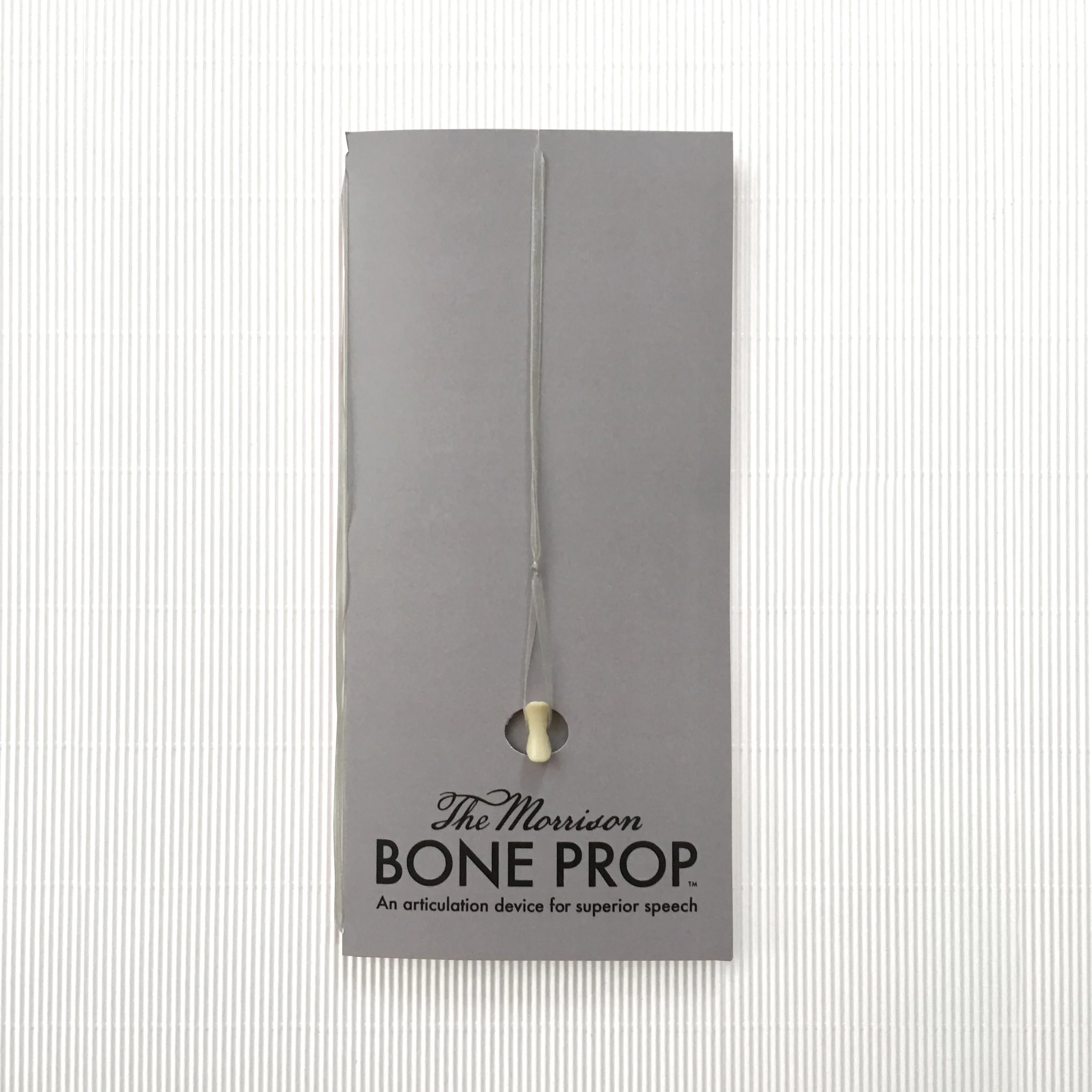 BONE PROPS WITH SILVER RIBBON