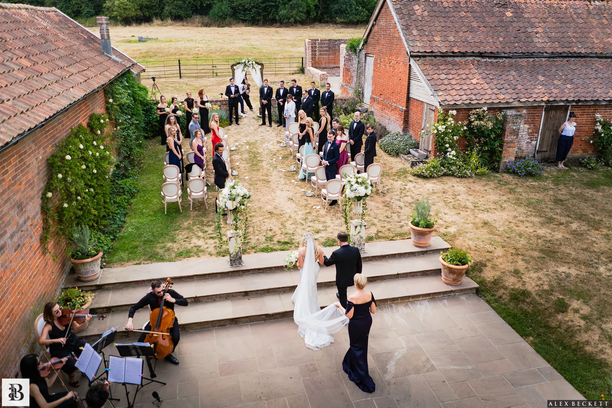 Louis Chairs were the perfect choice for the ceremony and reception to seat Amanda and Karol’s closest friends and family. we lined the aisle with earl grey rose petals and antique mirror trays of candles and delicate posies. HEr parents walked her down the aisle to debussy’s clair de lune, expertly performed by Scintillo String Quartet.