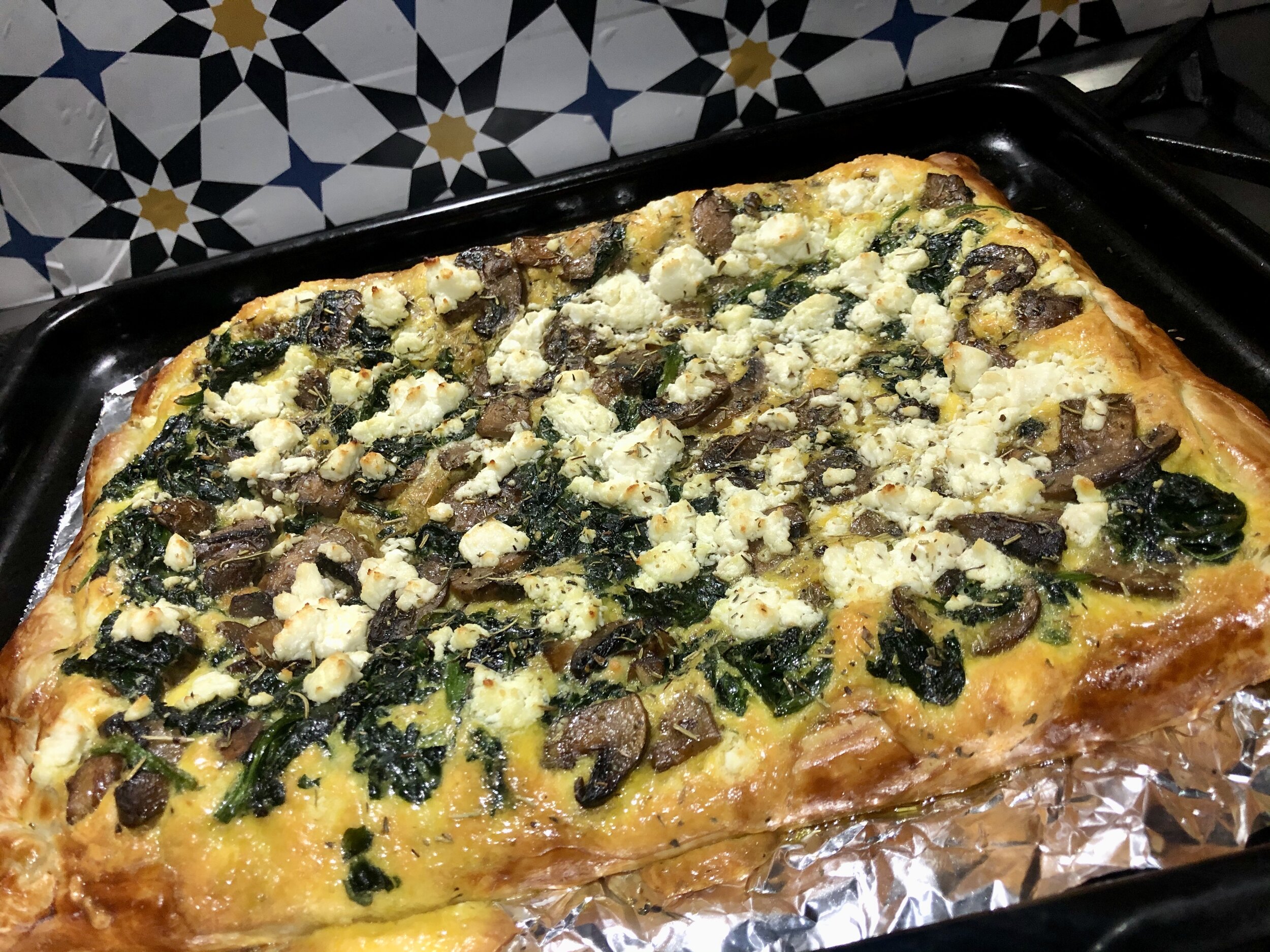  Mushroom, spinach, goat cheese pizza. 