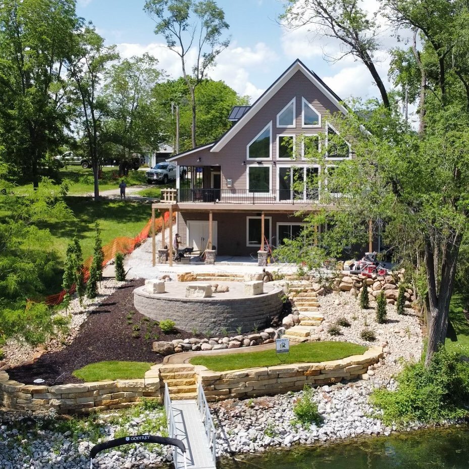 Fiddlehead sauce!! Cool shot of our current lake house project from @rk_development_group. #hardscapelife #landscapedesign #lakelife #drone