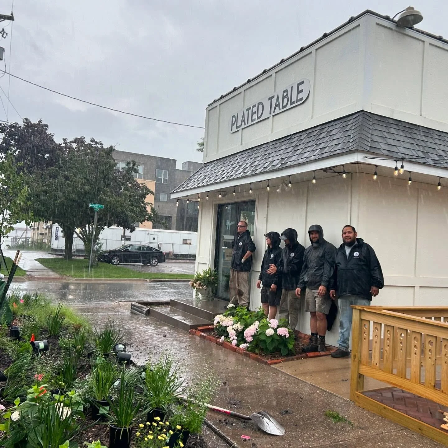 Amazing crews we have! These guys pushed through the rain to finished this planting for @plated.table . Here we are waiting the heavy stuff out which show dedication and grit of our team. Please go check out plated table for some good stuff happening