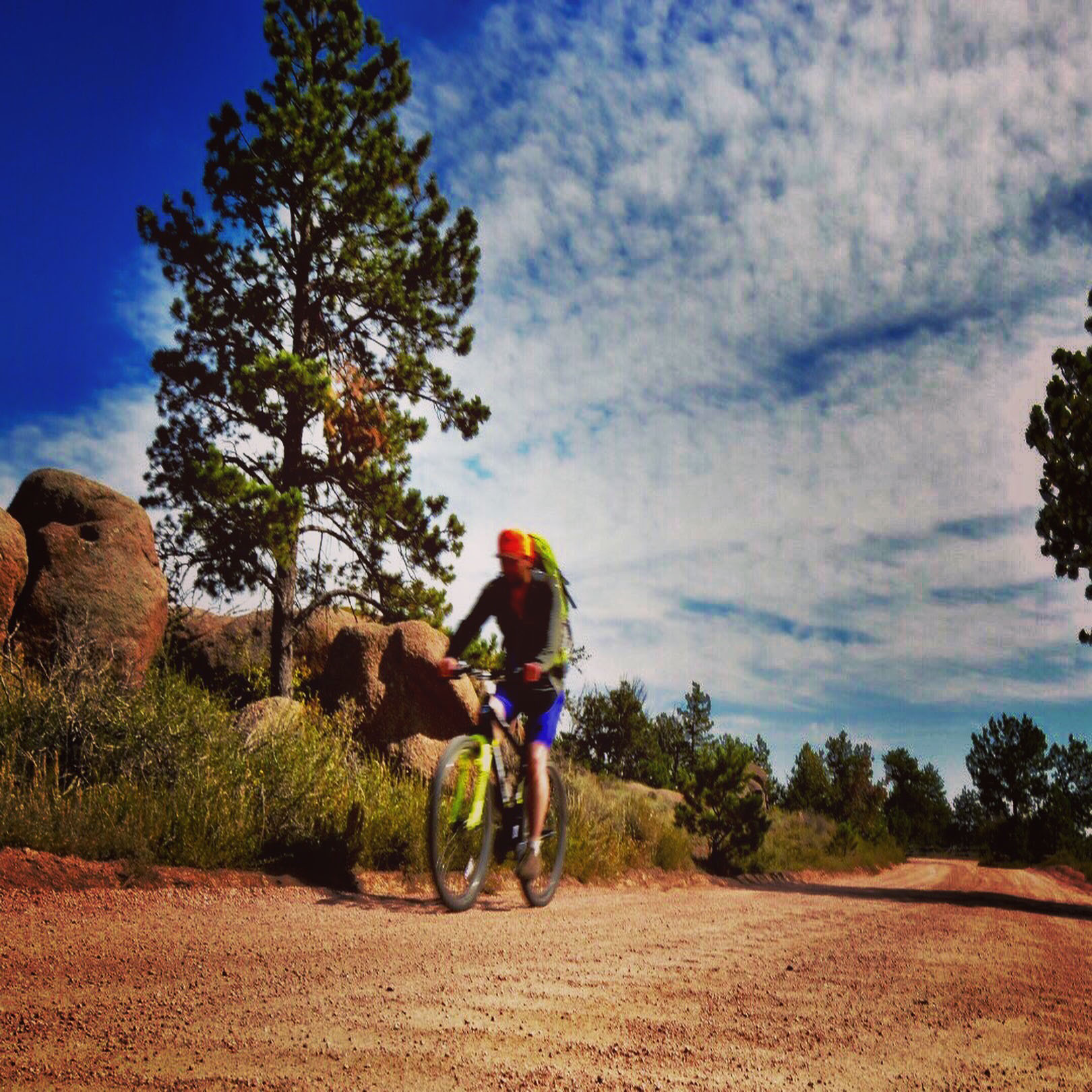 If you look closely, you can see the ripples in the road that just makes the drive interesting. And a biker who stopped and talked to me and then I asked him if I could take this shot. Love meeting people along the way.