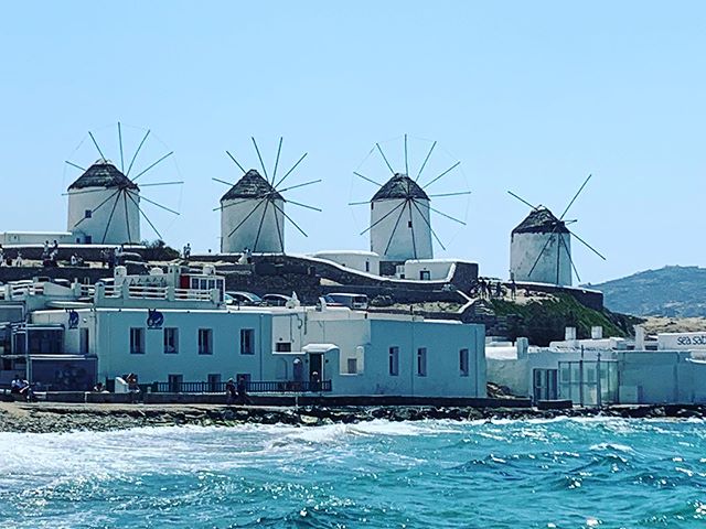 The four windmills of Mykonos. This place was unbelievably beautiful. The water was so clear and the cool breeze was so wonderful. #mykonos #greece #travel #beautifuldestinations #greek #goexplore #windmill #coastline #water #bluewaters #island #white