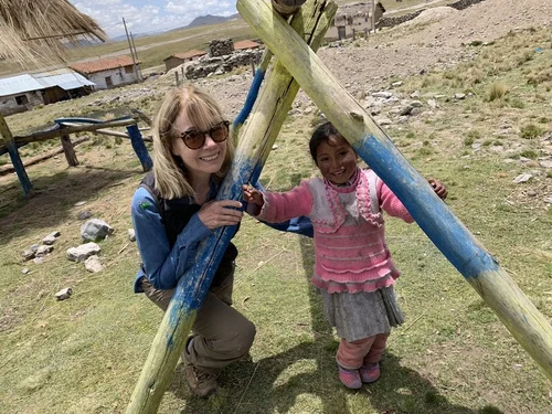 Martha Dudenhoeffer with a child in Ayacucho