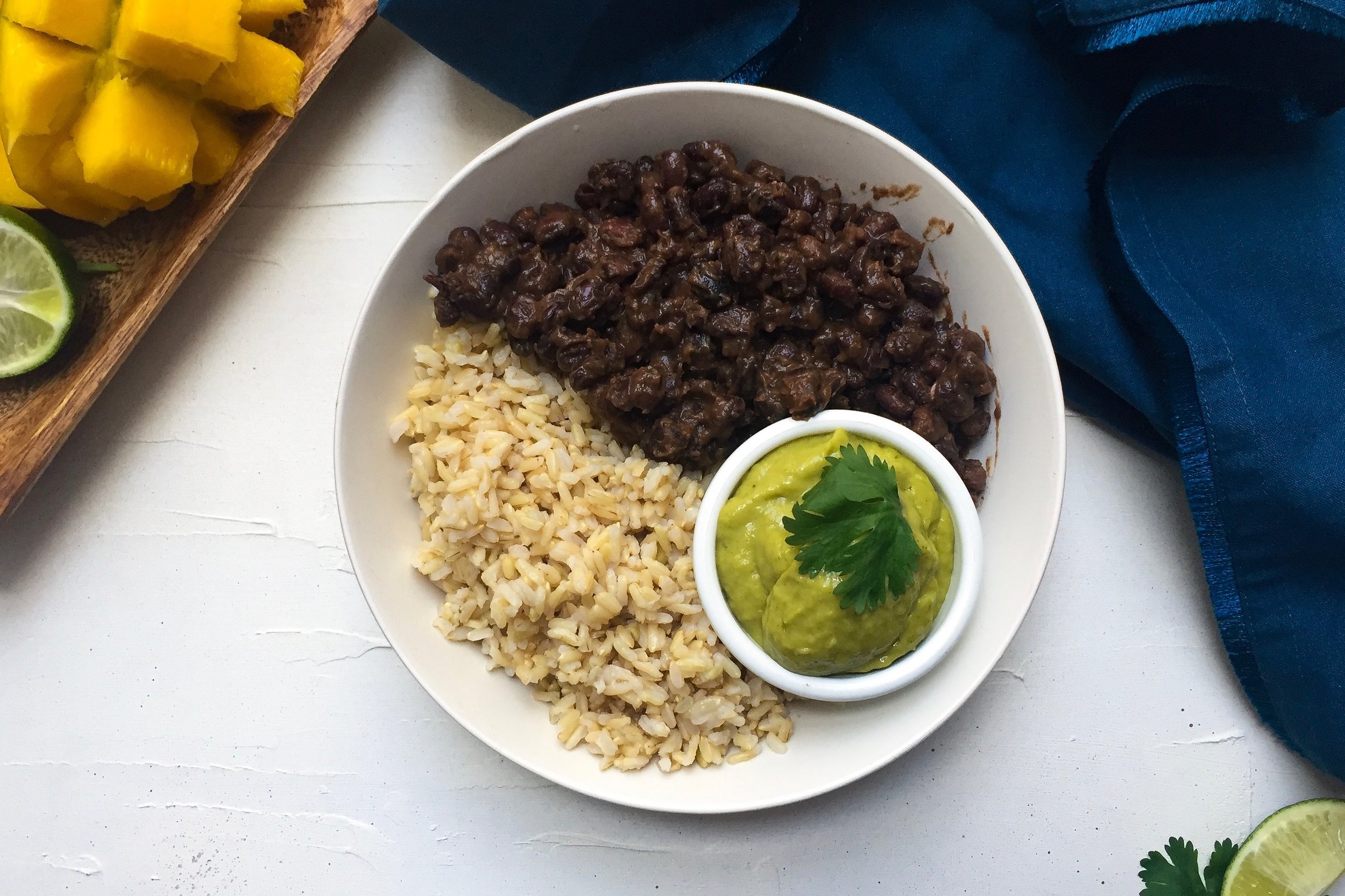Bean and Rice Bowl with Creamy Salsa Verde and Mango