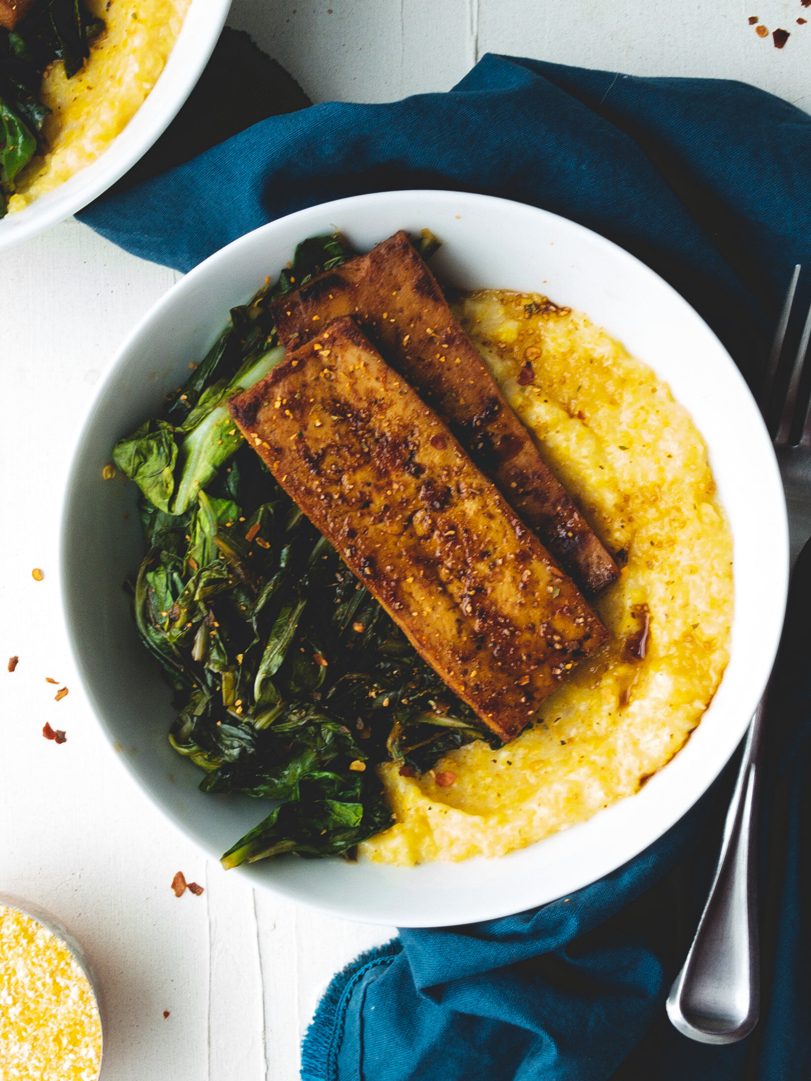 Savory Breakfast Bowl with Balsamic Collard Greens, Tofu Bacon, and Cheesy Grits