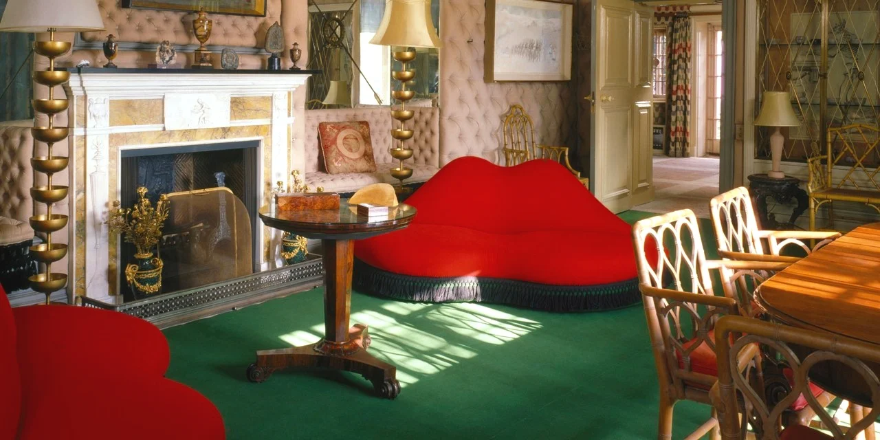 Salvador DalĂ's "Mae West" lips sofas at Monkton, the former home of Edward James. Photo by Elizabeth Whiting & Associates / Alamy Stock Photo