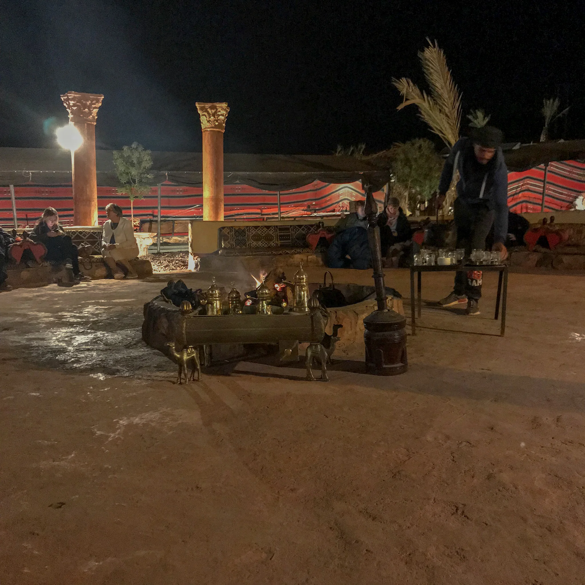 One of our host preparing tea over the camp fire to keep us wam until dinner is ready.