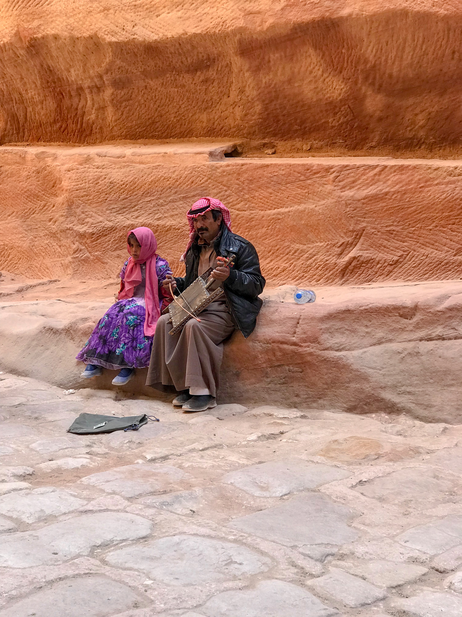 A local Bedouin and his daughter. When ever I see children in other countries I can't help but wonder what their every day life is like. As a little bedouin girl, it is likely that this way of life will be all she ever knows. If only I can see life …