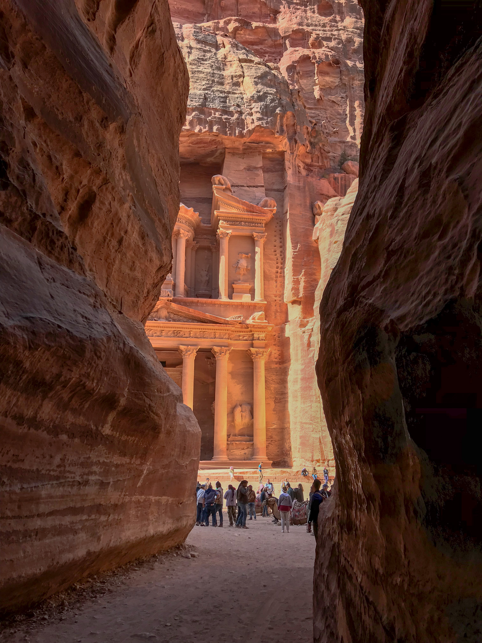 The only way to get to the treasury is through the this narrow canyon called the Al Siq. I held my breath for so long standing there at the first glimpse of this beautiful ancient site. I am still in awe to this day when I think about it. I was actu…