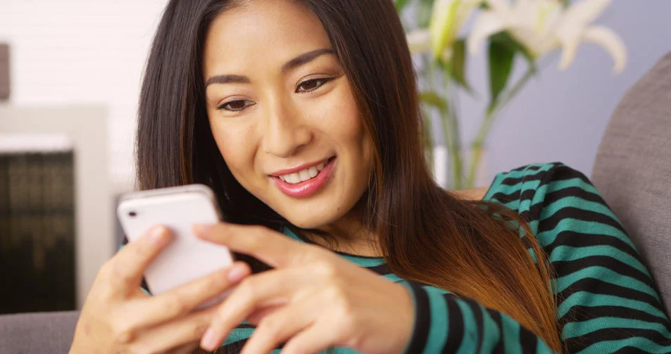 Girl Watching Mobile Video.jpg