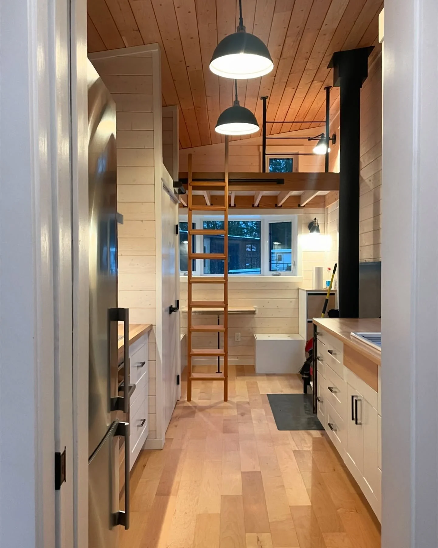 Our latest tiny house just made it in time before the snow hit, and we couldn&rsquo;t be happier with how it turned out! This one features tongue-and-groove wall paneling&mdash;something we haven&rsquo;t done in a while, and it was so fun to bring it