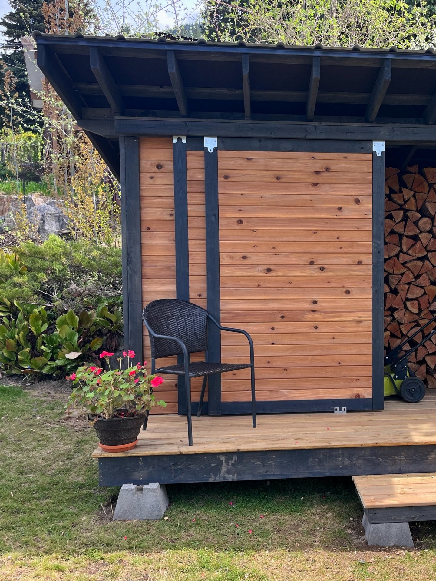 Finished up this custom woodshed build last week!

The shed can comfortably fit a couple of chords of wood as well as spare garden equipment, helping to keep the yard organized and ready for the colder months. This project came together great with a 