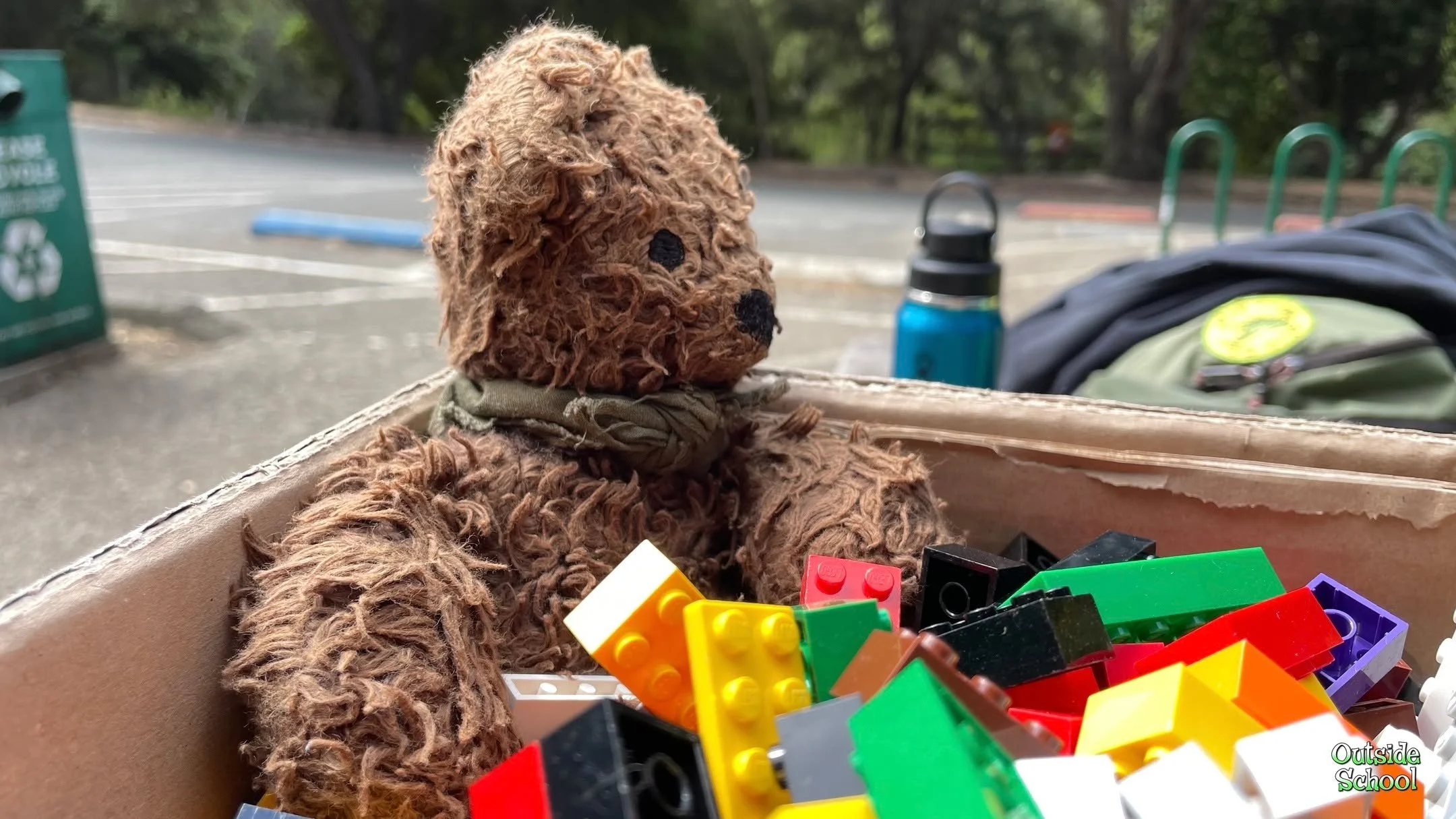Bandana Bear, are you actually SWIMMING in that giant box o' Legos?!?!
You never know what's going to happen at Outside School camp, Bandana Bear, or one of the awesomest open-ended toys ever, do you?!?!
😎 Two more weeks of camp are open for enrol