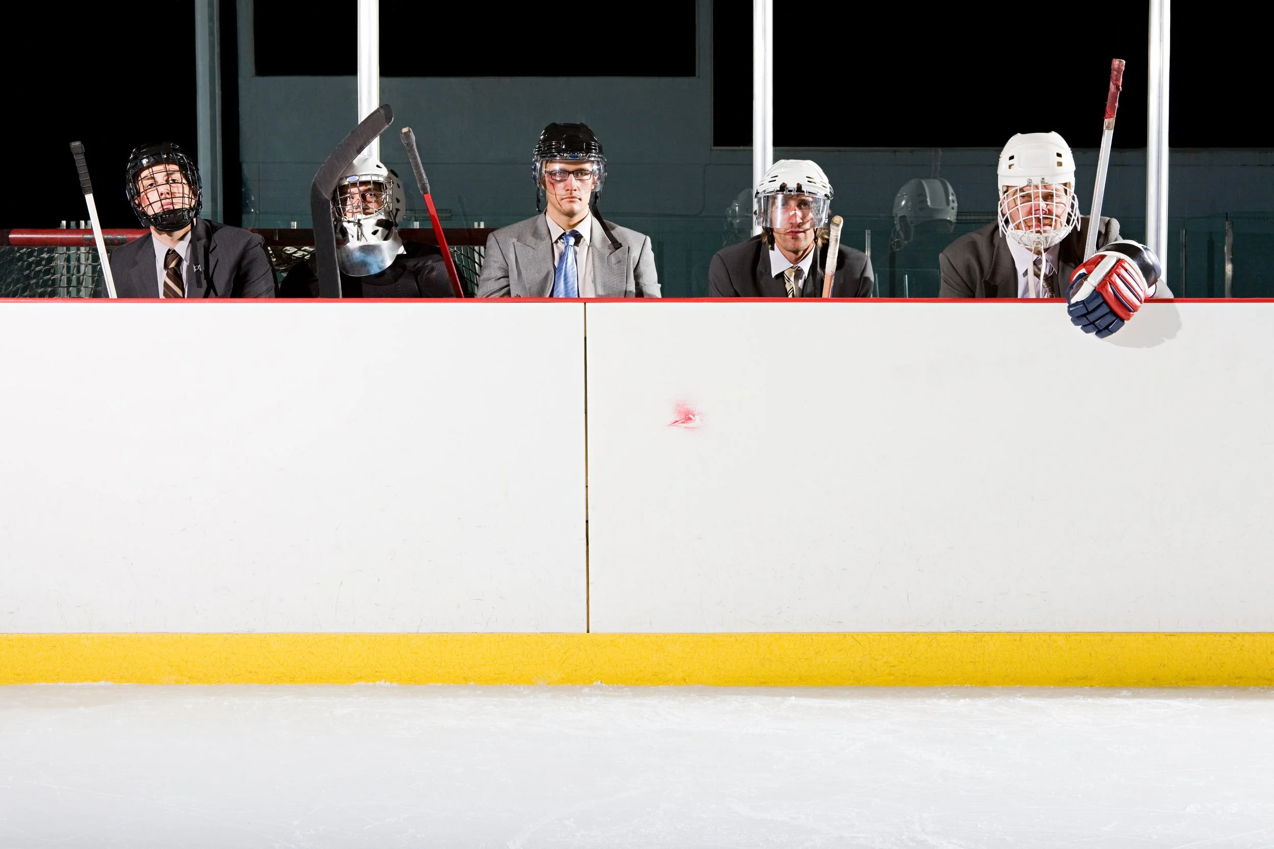 businessmen-in-hockey-gear-in-the-penalty-box-2026-09-22-19-31-28-utc.jpg
