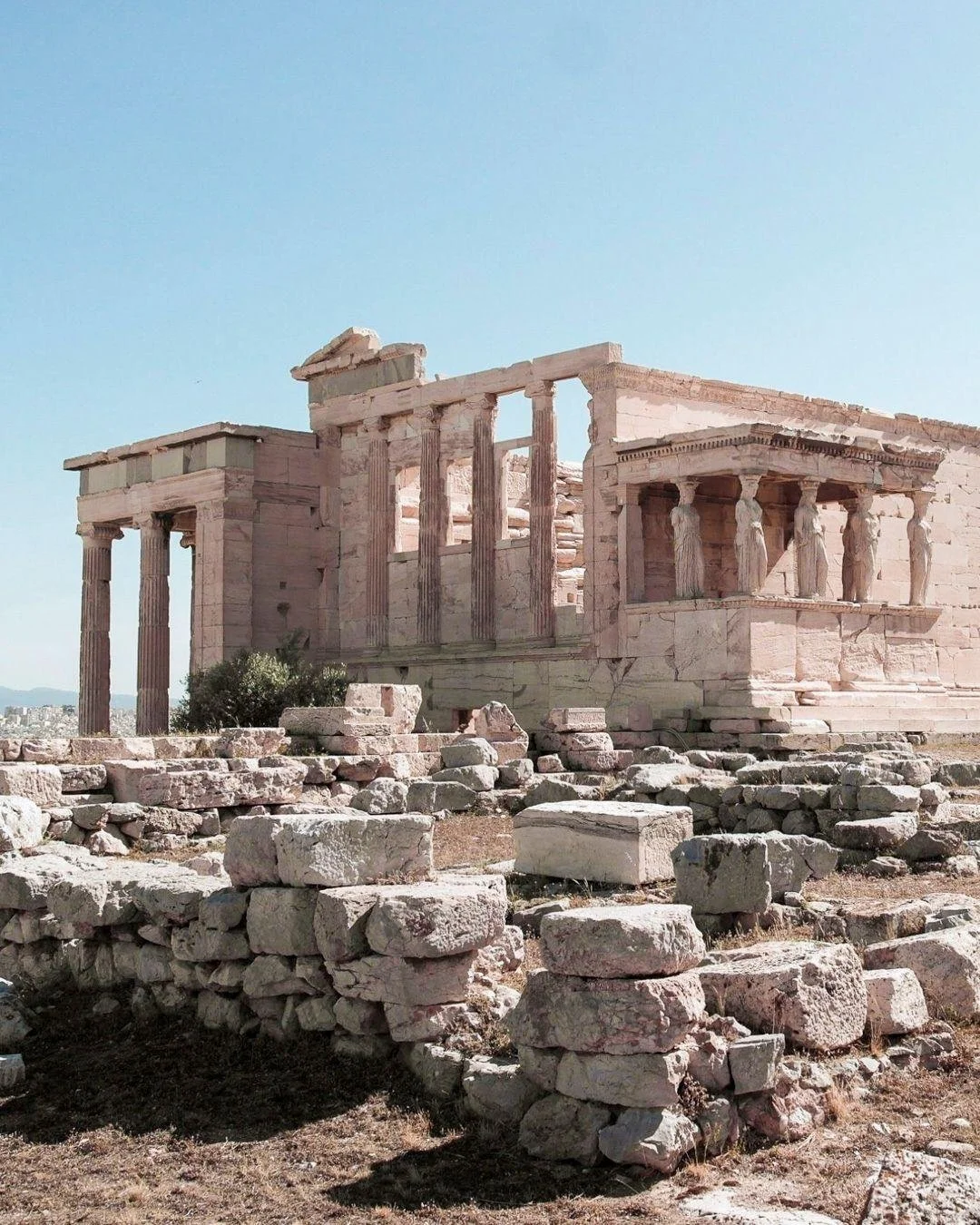 There is nothing quite like waking up in the &ldquo;Neighborhood of the Gods&rdquo; in Athens.

Along a peaceful pedestrian street, the boutique hotel A77 Suites Athens is wrapped in bougainvillea and surrounded by ancient monuments, with the Acropol