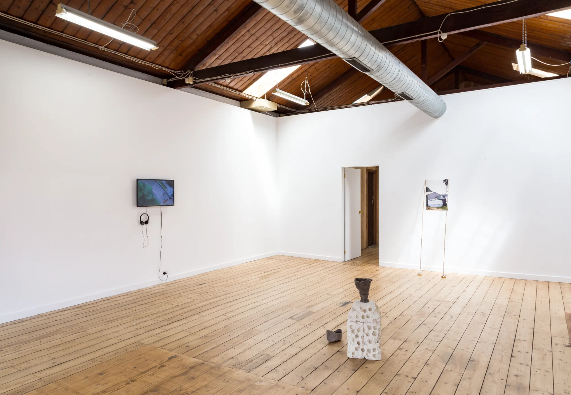 Left to right: Ella Sowinska, Tropical Islands , 2016 HD video, 16:44 Noriko Nakamura, Untitled , 2016 cat hair with white mould, decomposed cat hair with wool moth, limestone Mashara Wachjudy, No place for rain , 2017 inkjet photographic print, bamboo, earthenware clay, oyster shell, rice photo by André Piguet