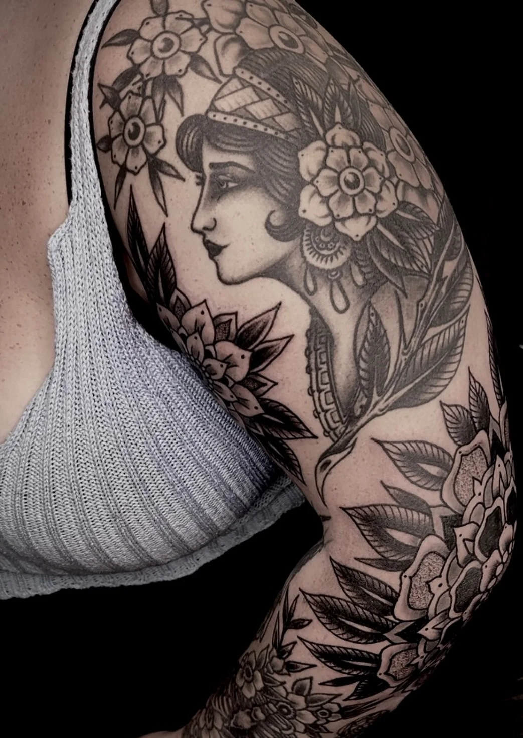 bold black and grey full arm sleeve tattoo central coast