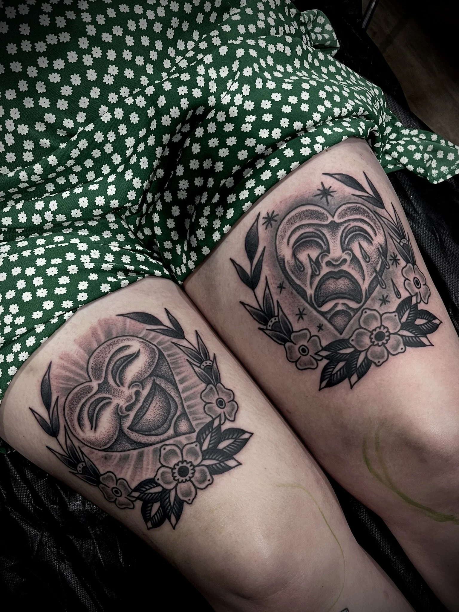 traditional happy and sad heart tattoo on thighs