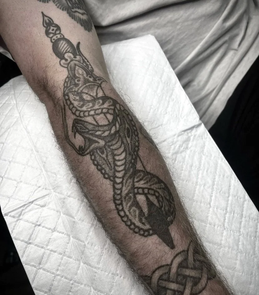traditional snake and dagger tattoo