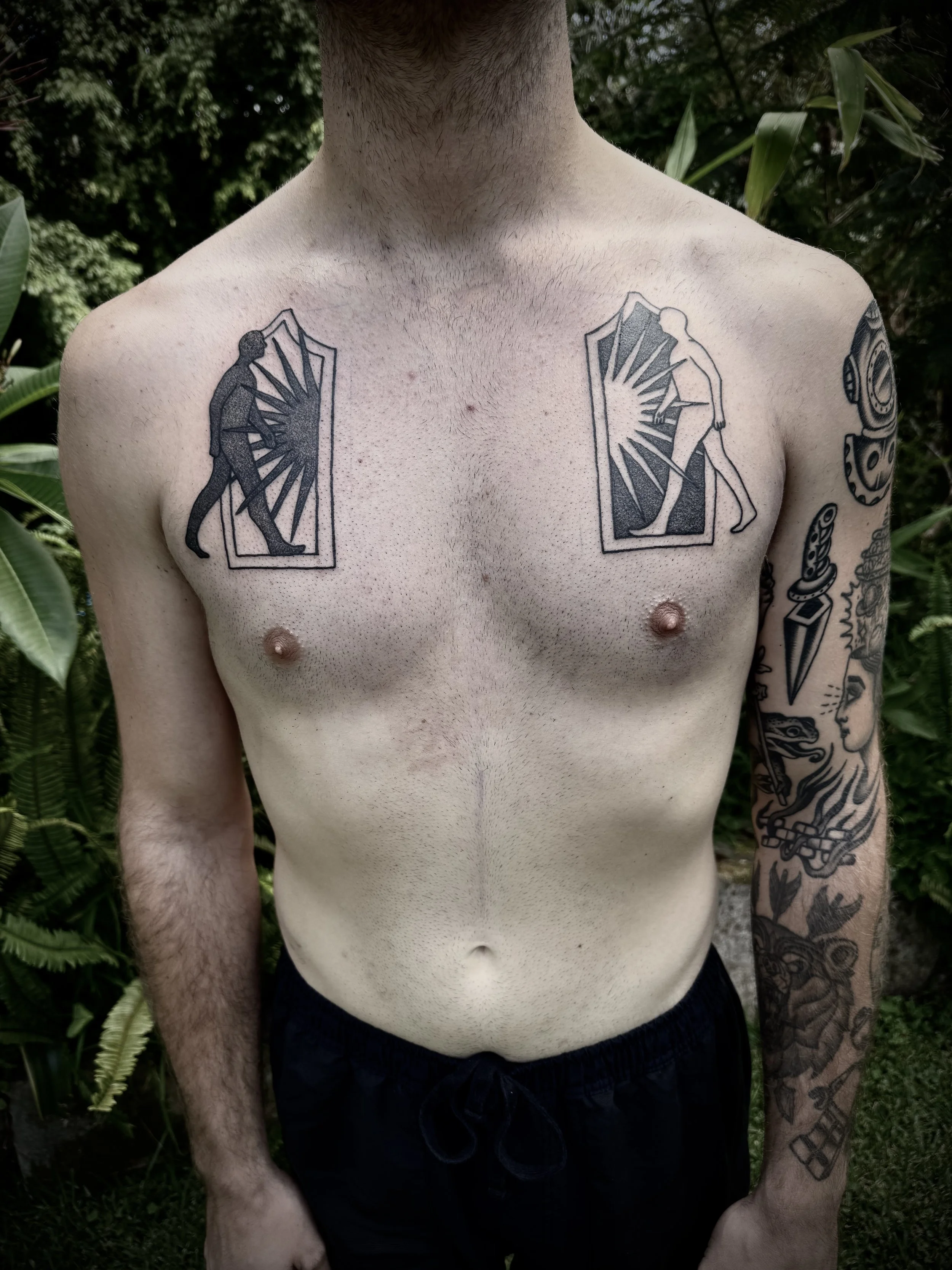 black and grey medium chest tattoo central coast