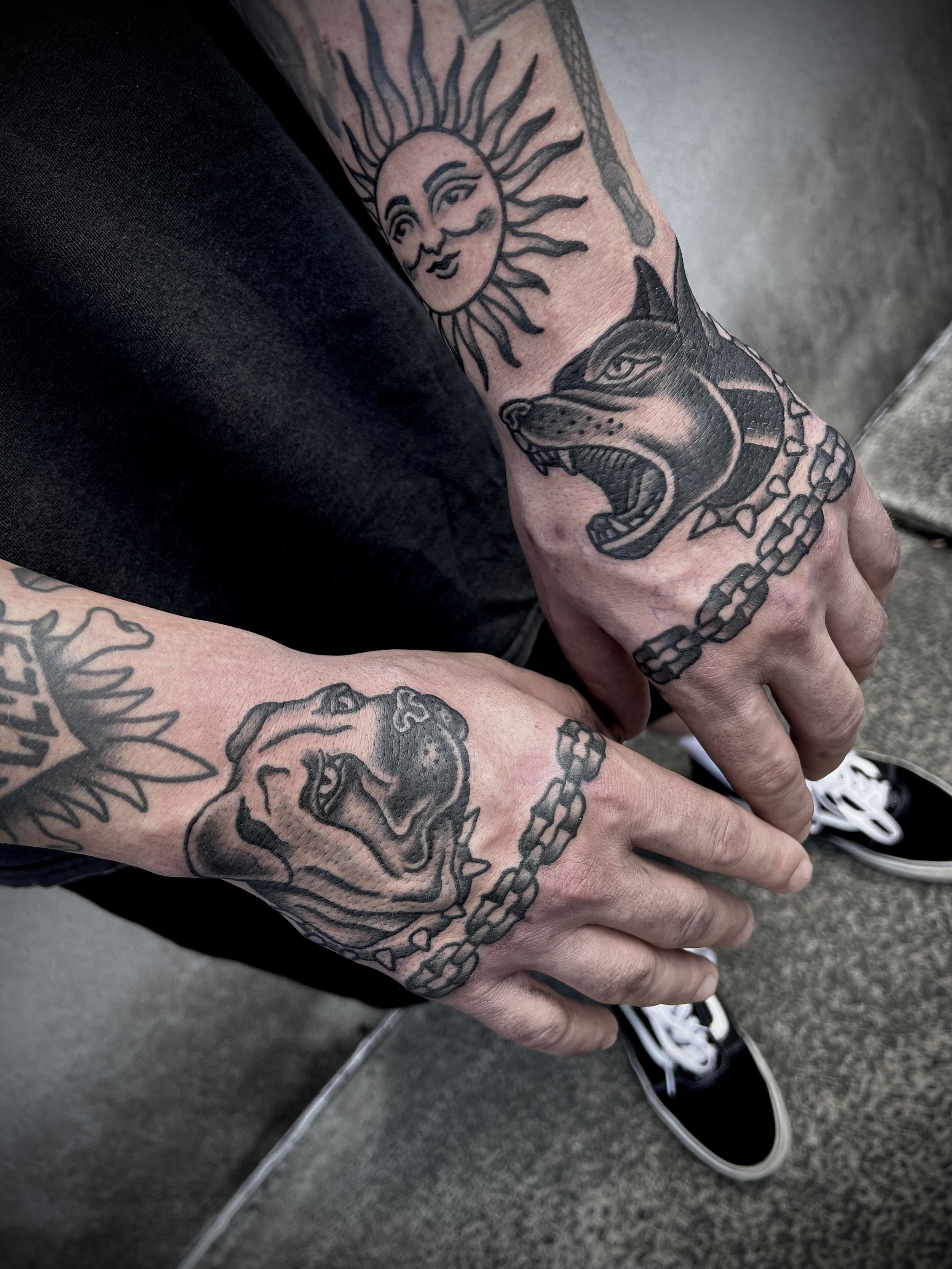 Traditional dog tattoo hand tattoo