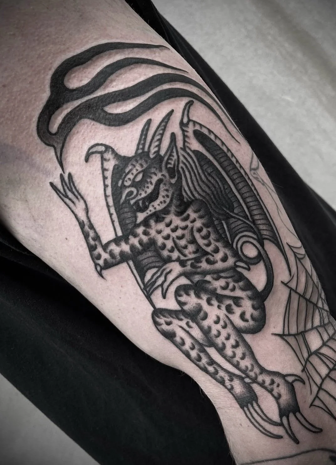 traditional devil tattoo arm black and grey traditional