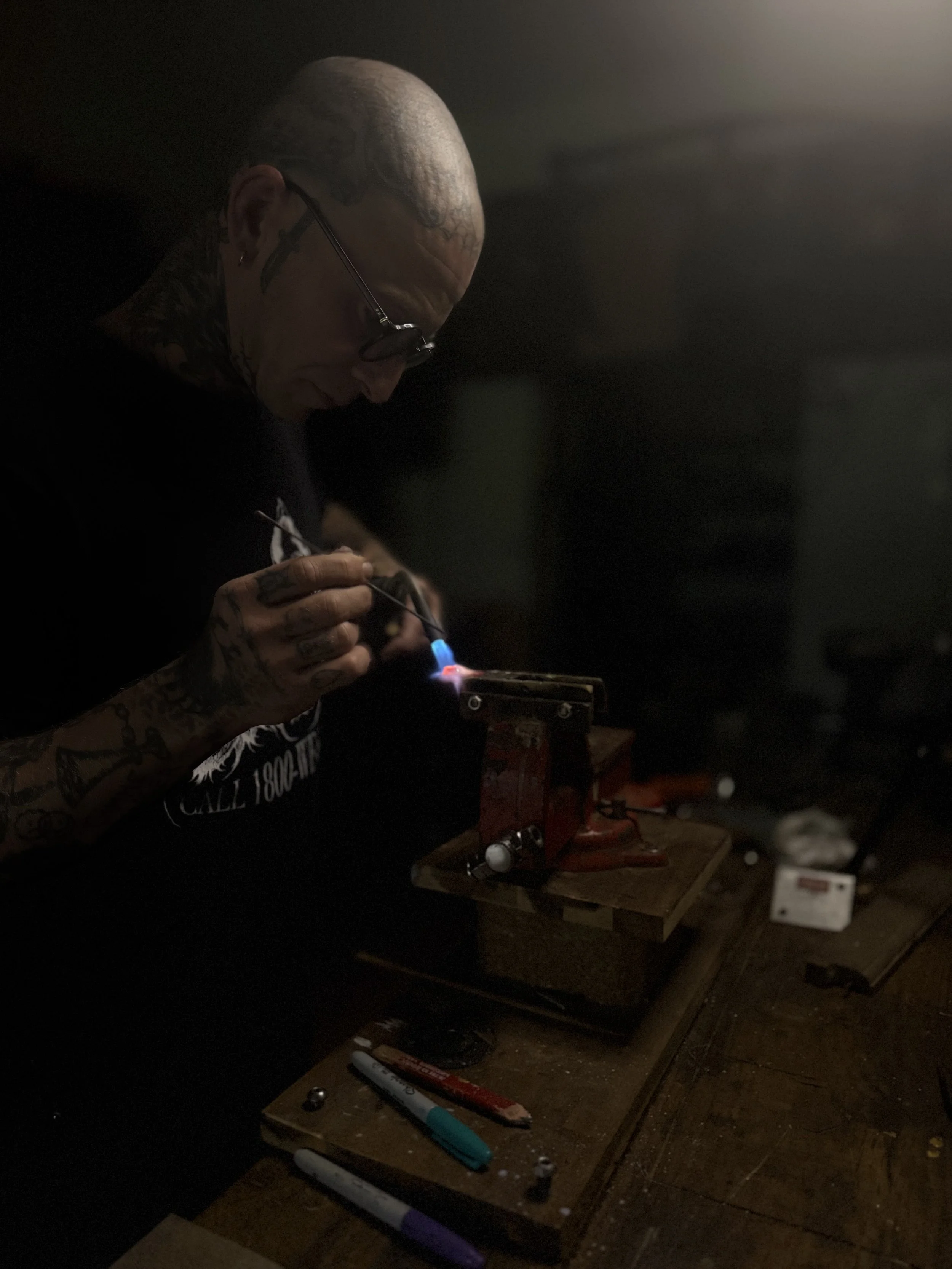 tattoo artist brazing key ring