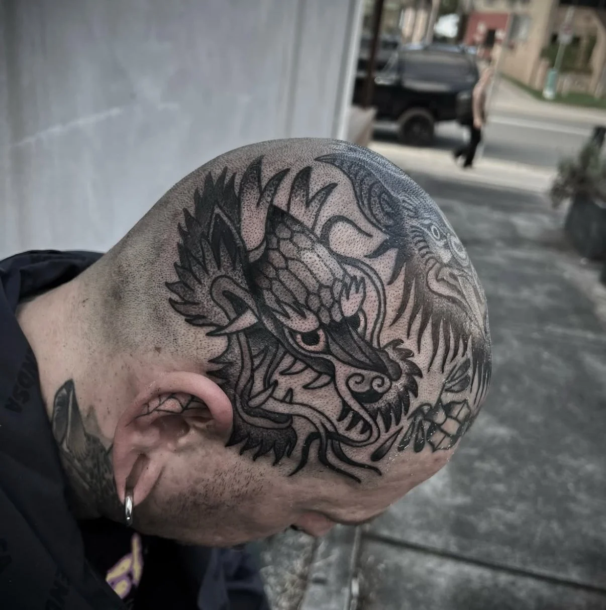 dragon head tattoo bold black and grey traditional