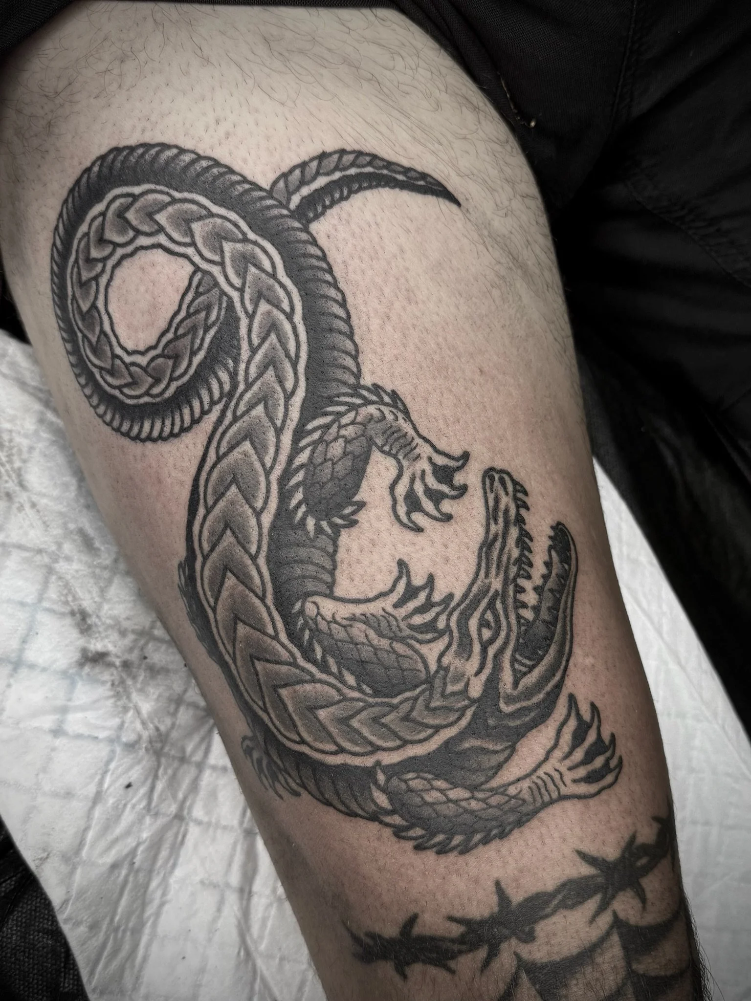 traditional crocodile tattoo on the thigh tattoo studio central coast