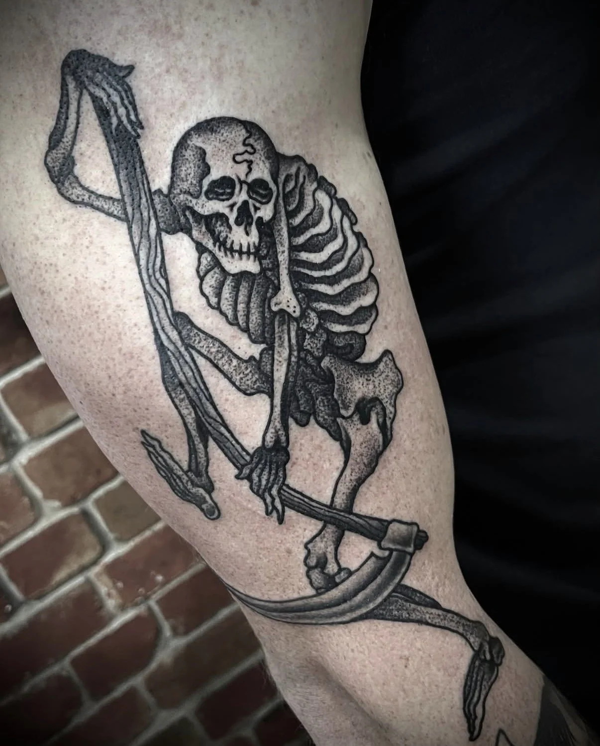 japanese skeleton black and grey upper arm tattoo