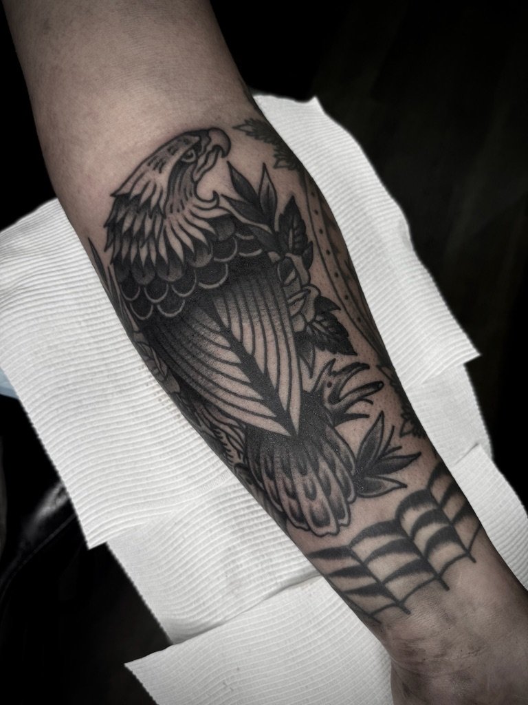 bold traditional eagle tattoo on arm