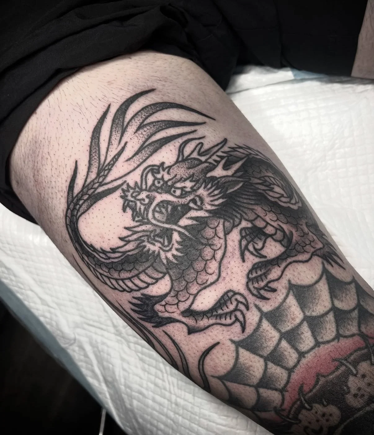 japanese black and grey dragon tattoo leg