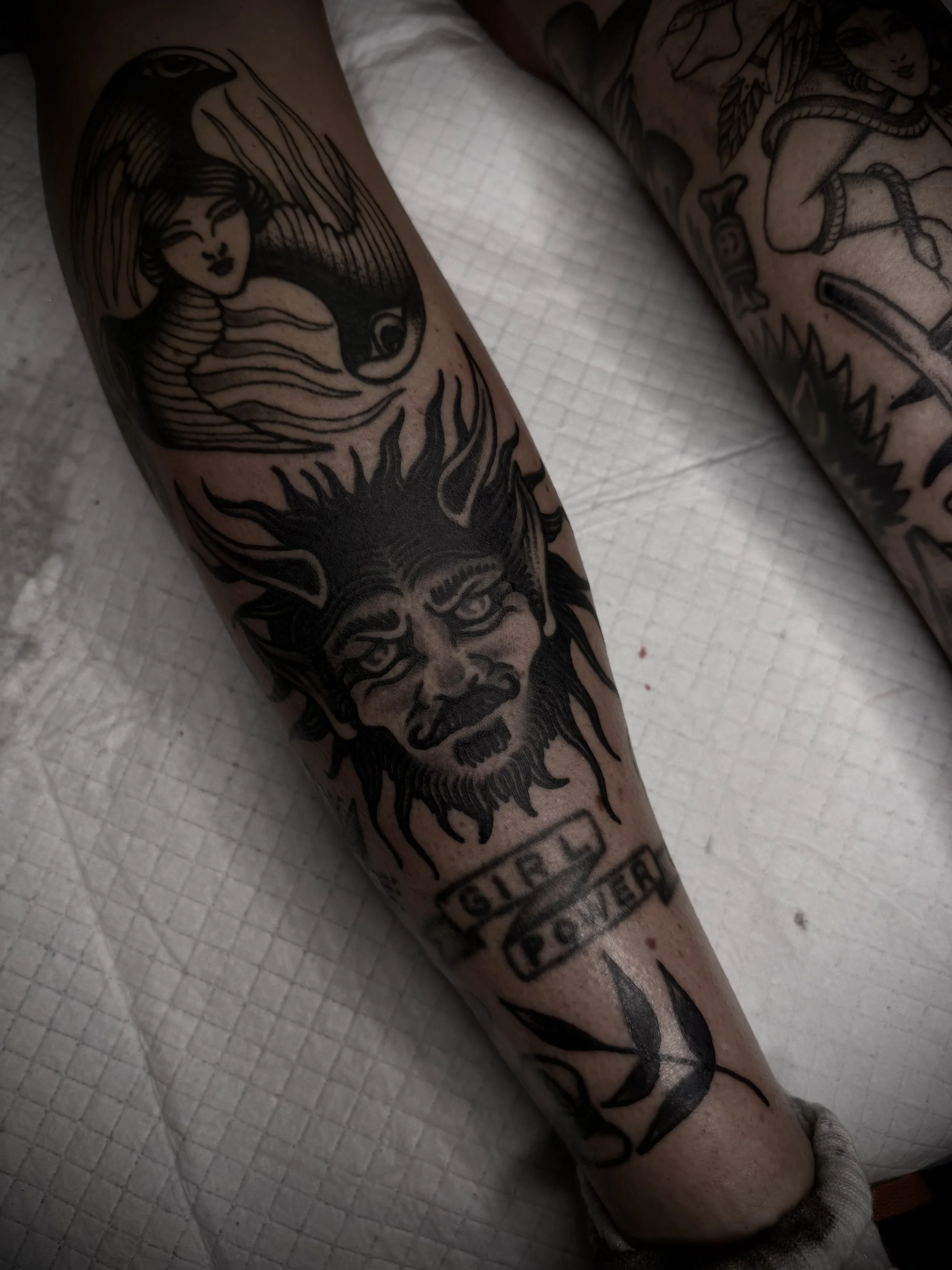 traditional demon leg tattoo black and grey