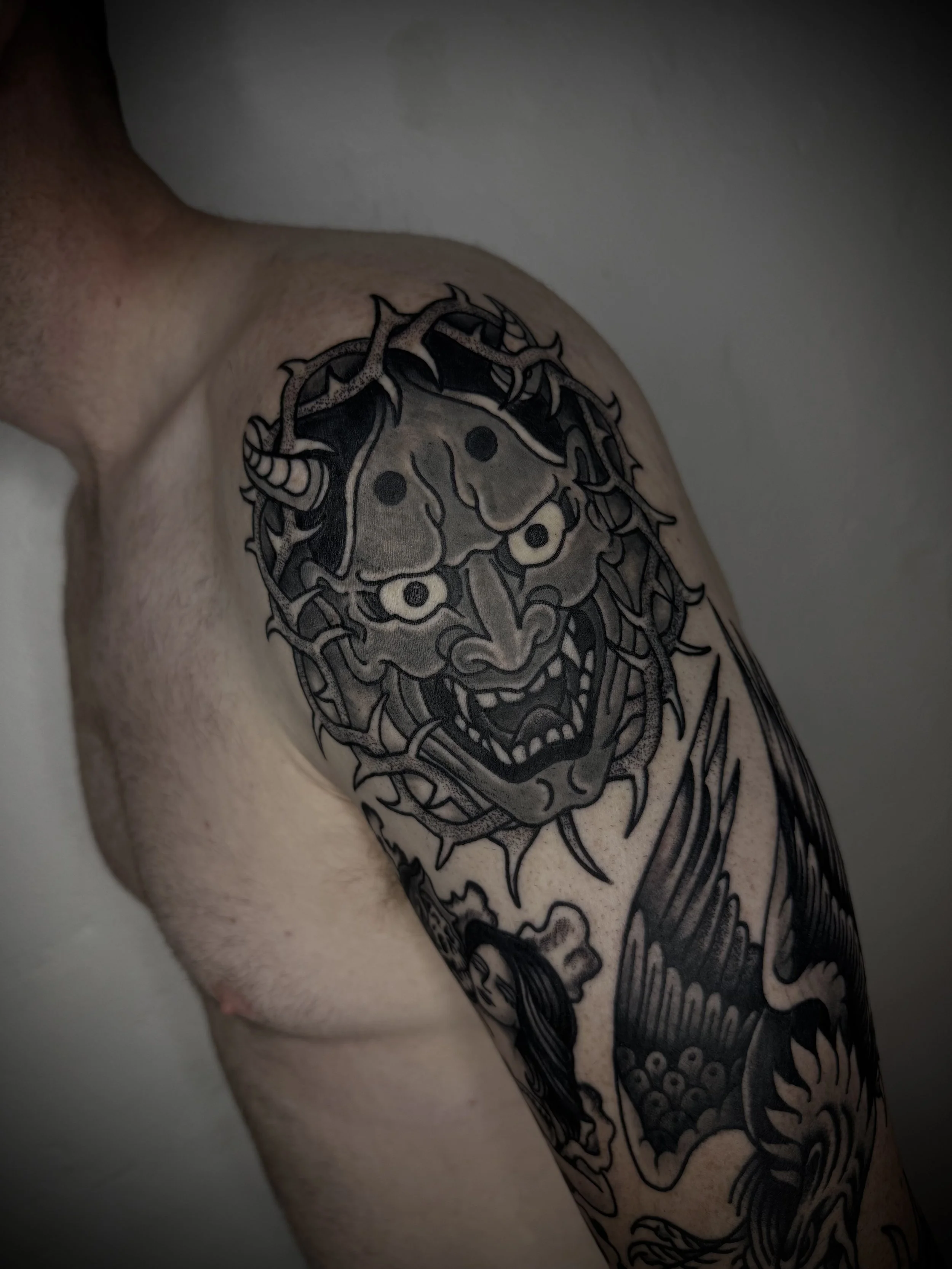 japanese hannya tattoo black and grey arm