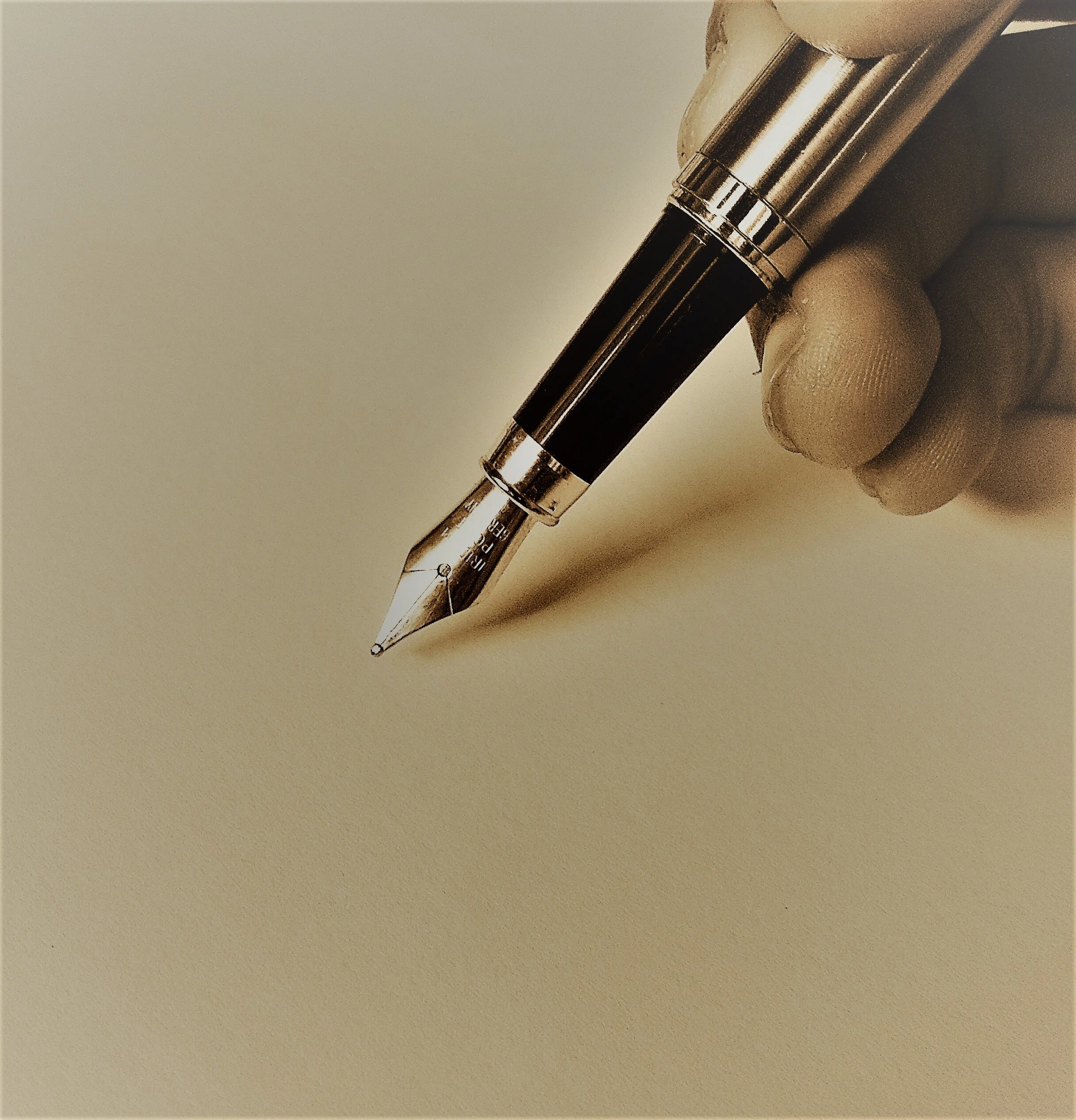 person-holding-fountain-pen-753695.jpg