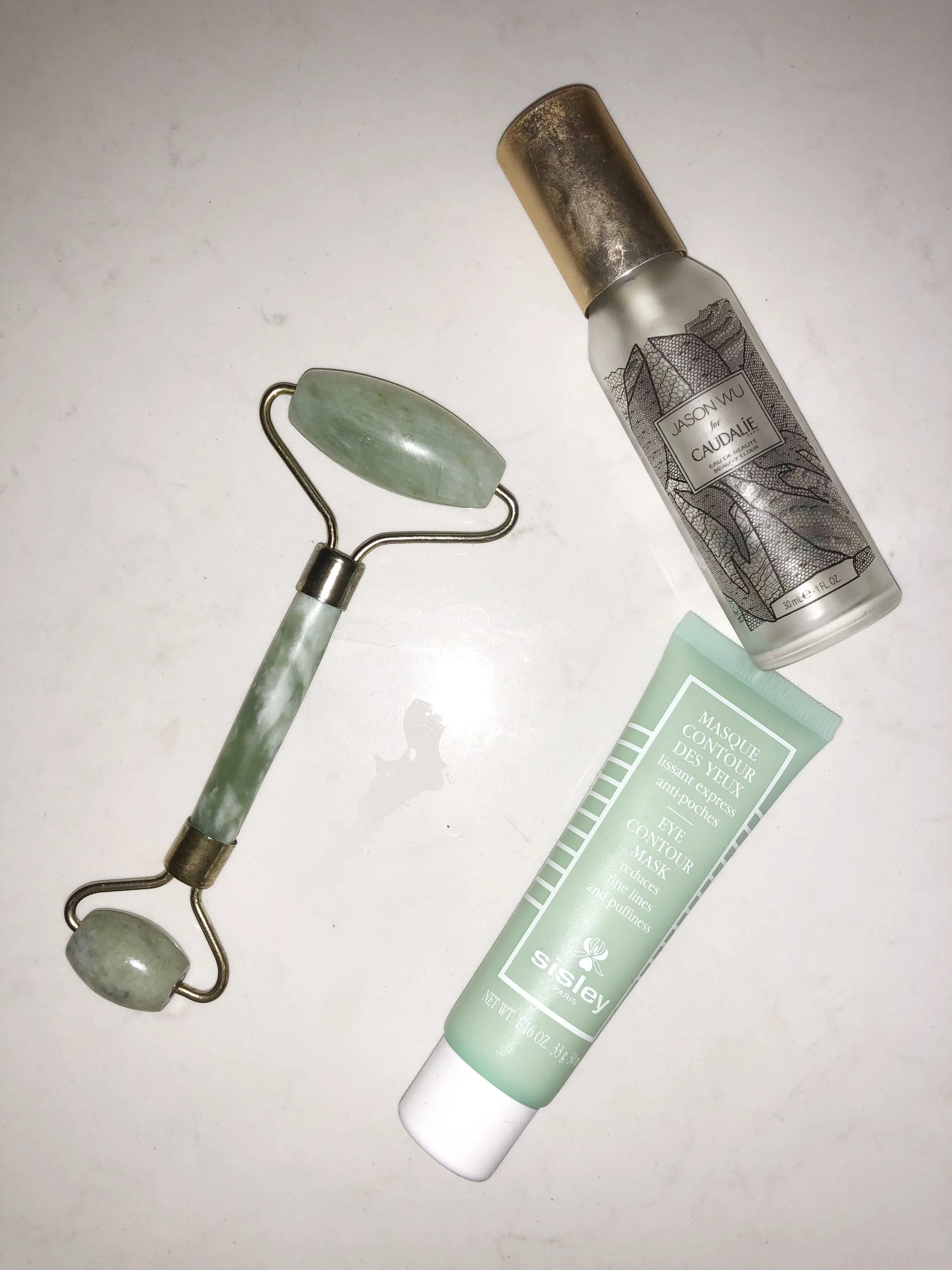 Every morning I use my Jade Roller , Sisley Eye Contour Mask and Caudalie Facial Spray . AND as a tip, keep your eye/face creams and Jade Roller in your fridge. Using the cold products on your face in the morning helps reduce puffiness and inflammation. 