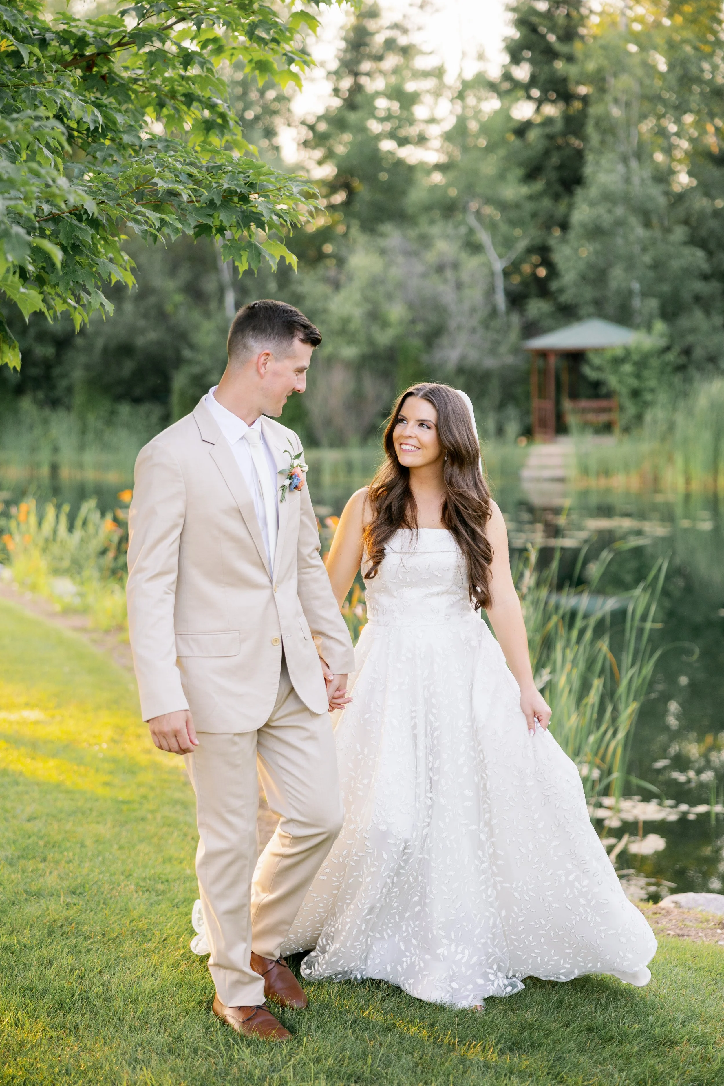 bride and groom walking at castle farms in charlevoix michigan