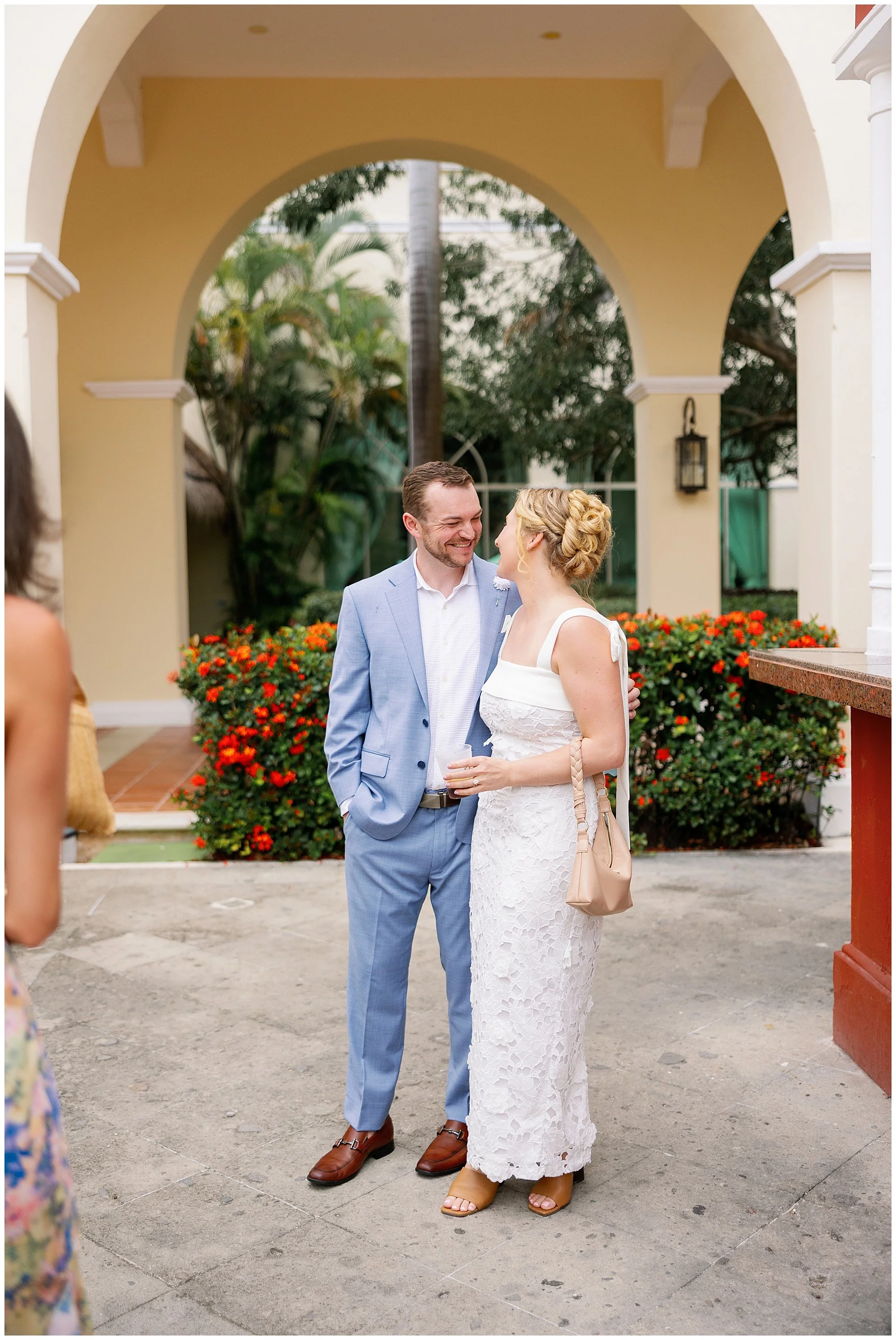  bride and groom smiling at each other at valentin imperial resort in riviera maya 