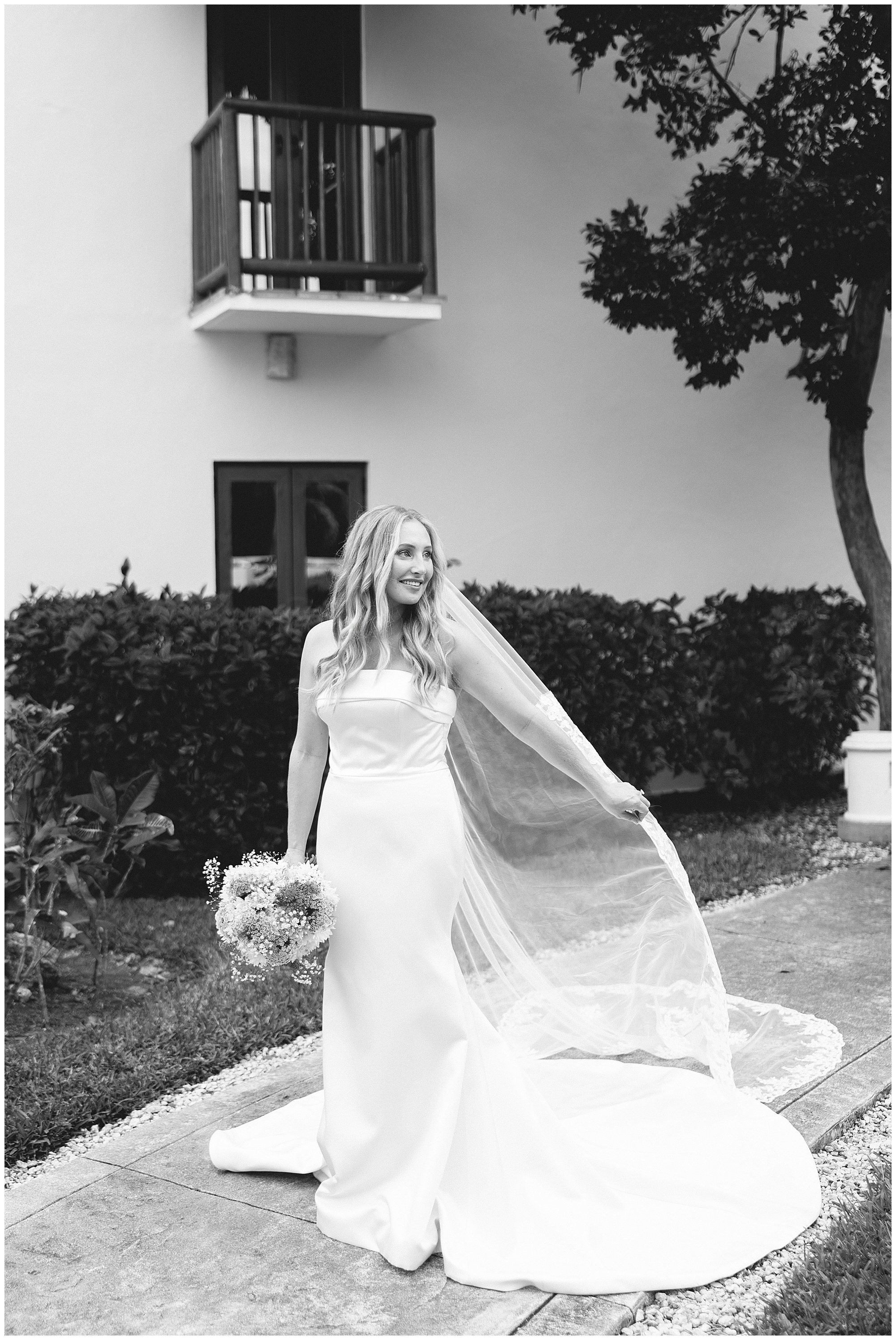  beautiful bride portrait with veil blowing at valentin imperial resort in riviera maya 