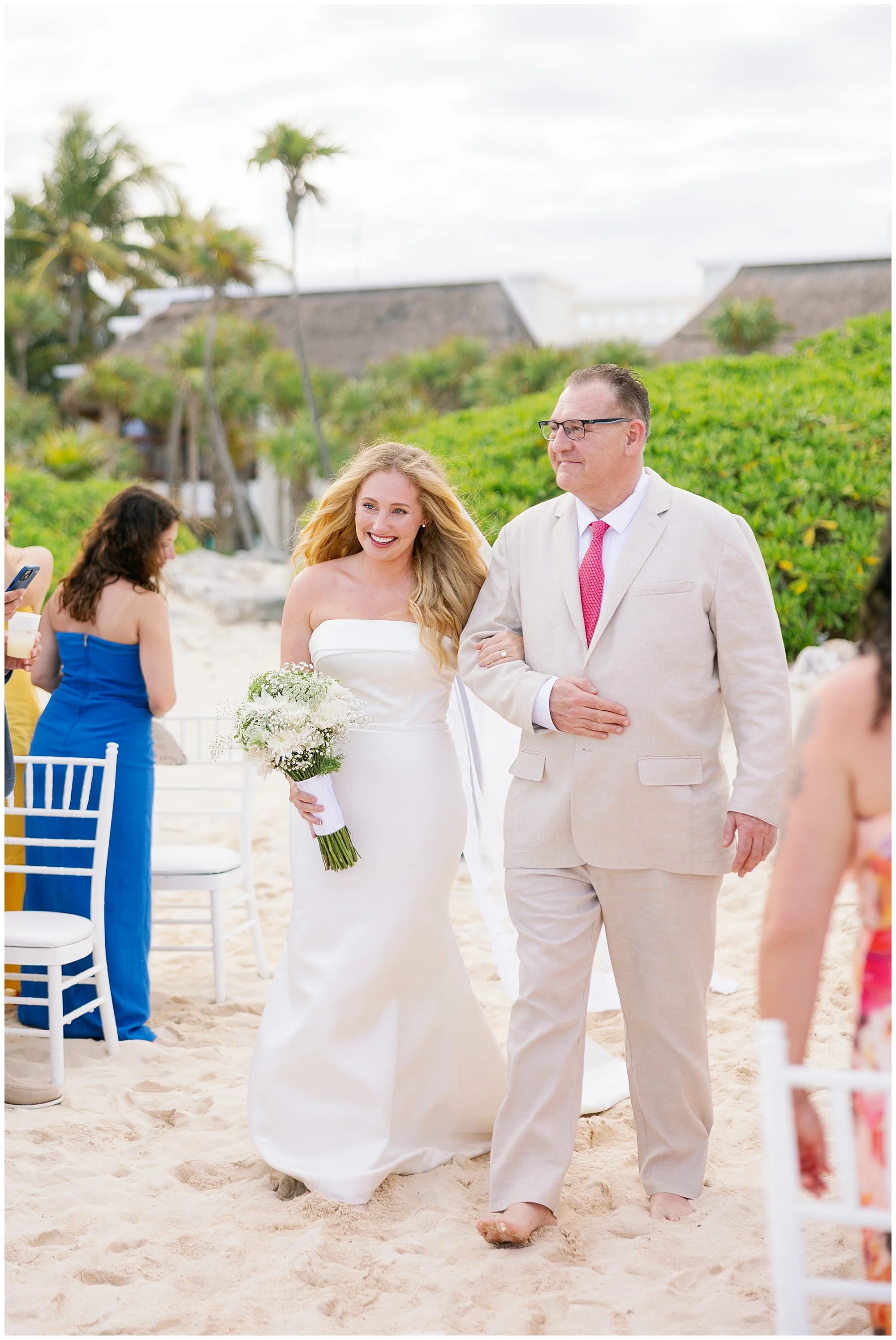  bride walking down the aisle with dad at valentin imperial resort in riviera maya 